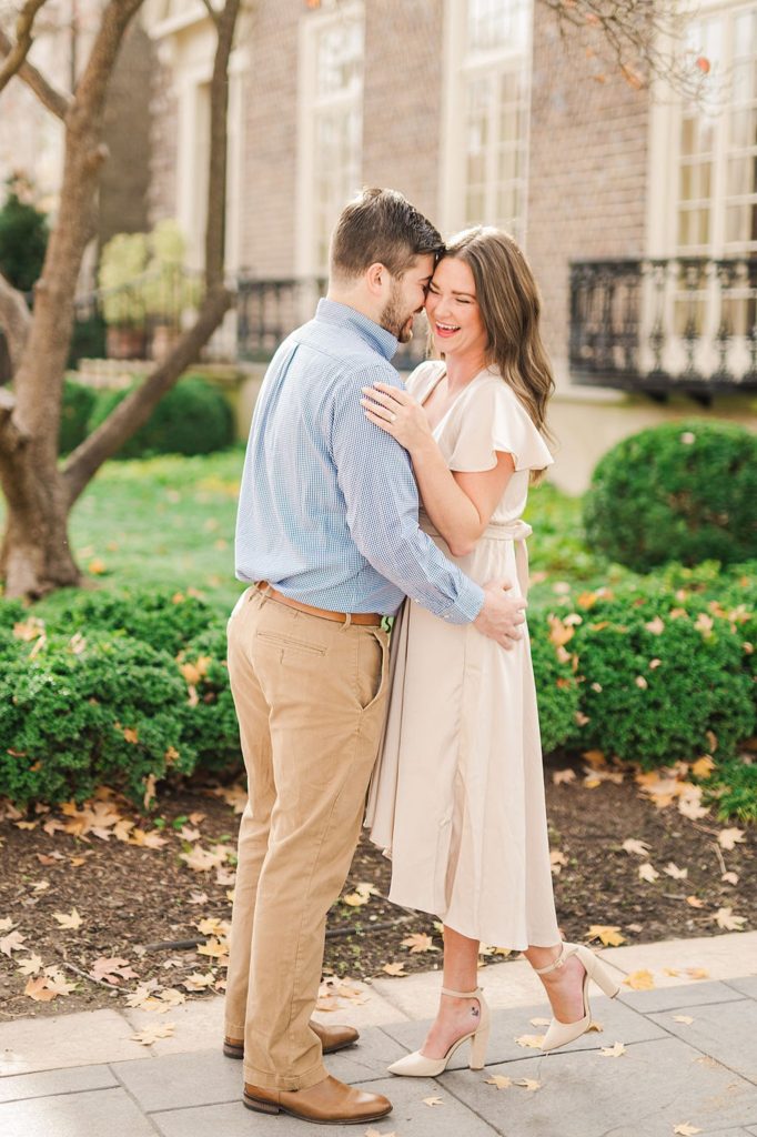 bride and groom holding each other during their Engagement Photos Richmond VA