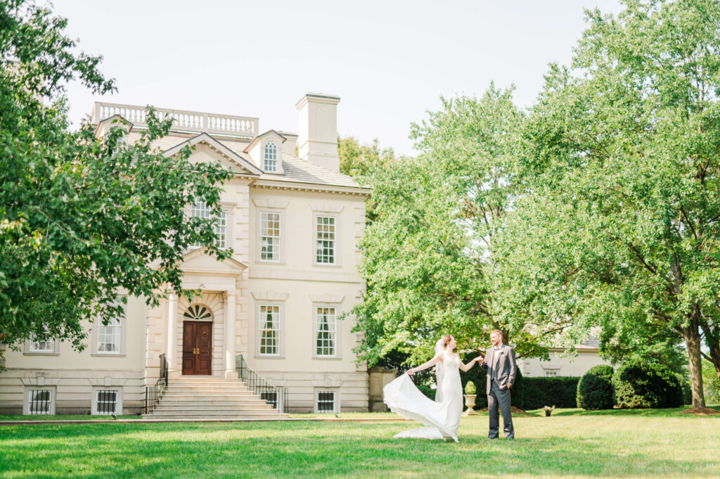 wedding couple dancing on lawn at Great Marsh Estate in Virginia