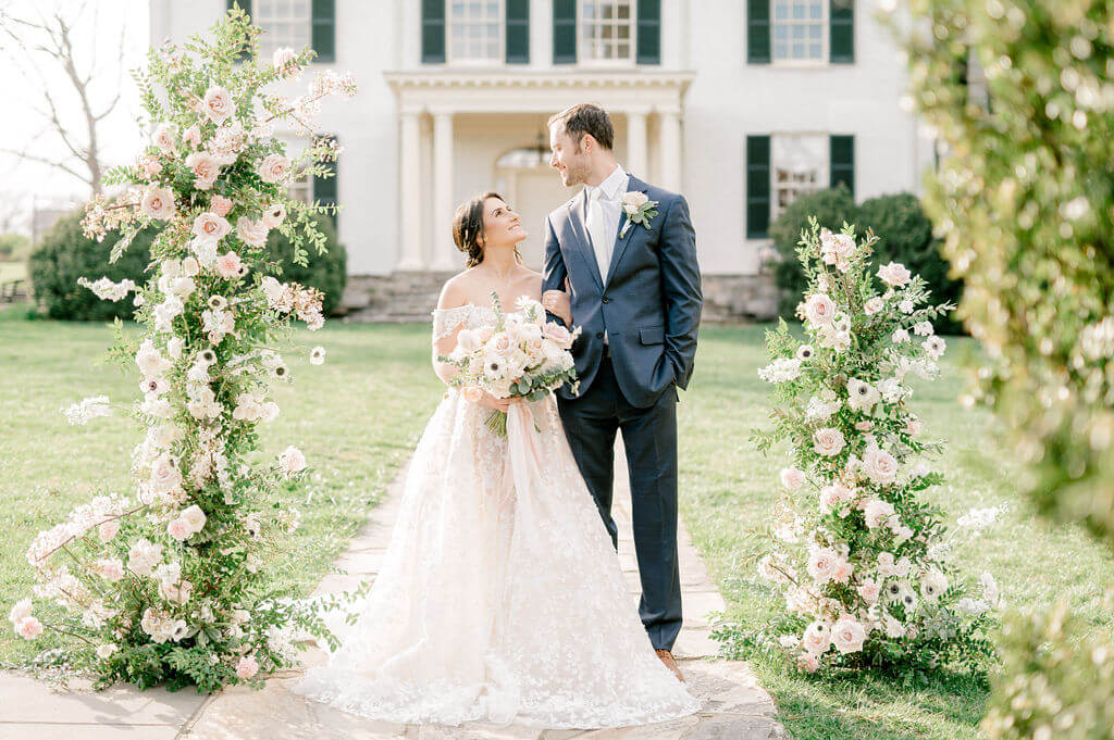 Bride and groom looking at each other at Rust Manor House, a Northern VA Wedding Venue